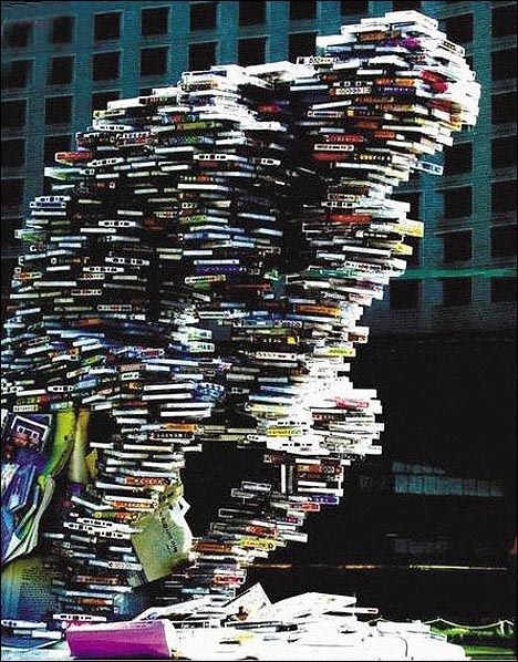the thinker made of books - balancing act